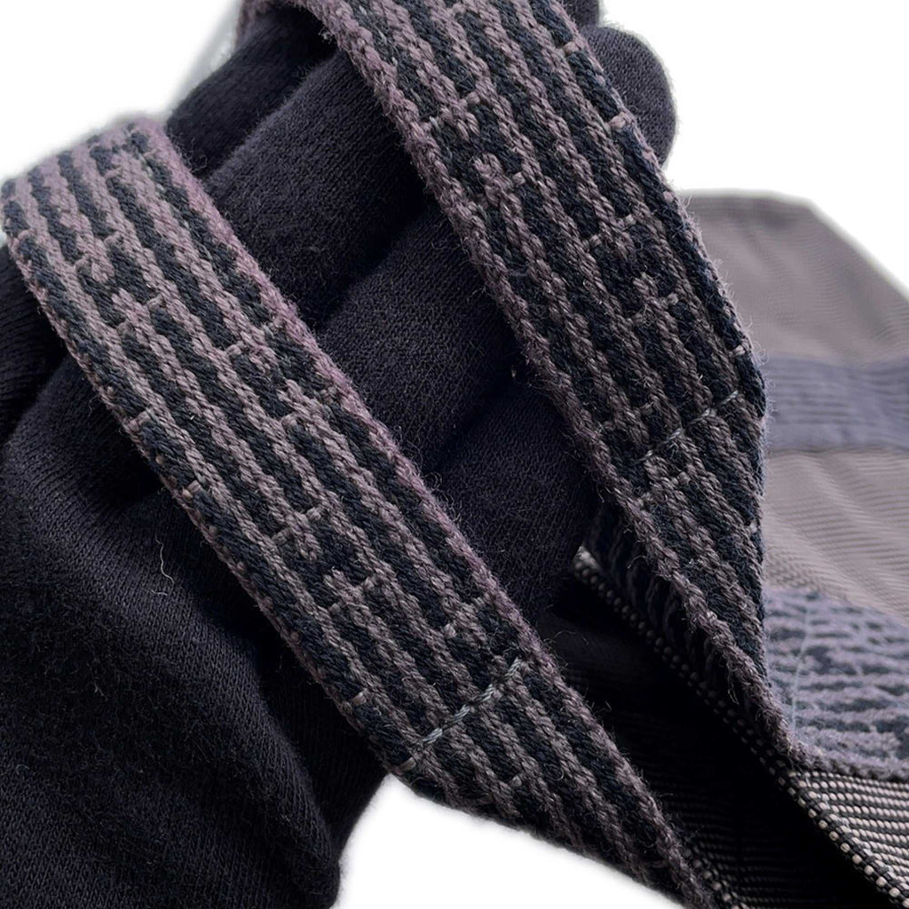 Close-up of the strap detailing on the Hermès Pre-Loved Air Line PM Tote Bag by MANSII