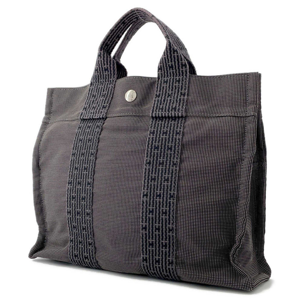 MANSII Hermès Pre-Loved Air Line PM Tote Bag in stylish black with durable fabric construction