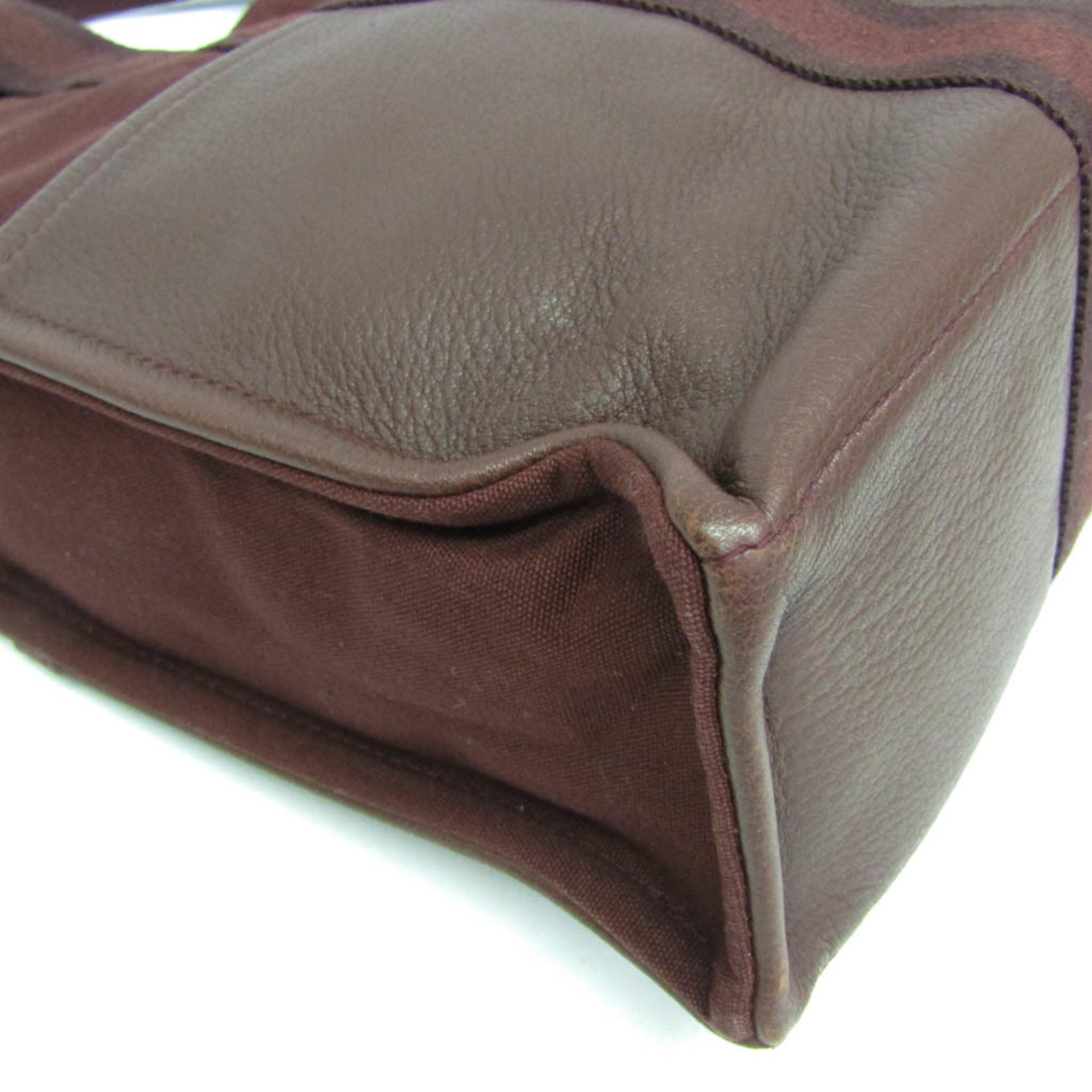 HERMÈS Pre-Loved Fourre Tout MM tote bag in rich brown leather with a spacious design