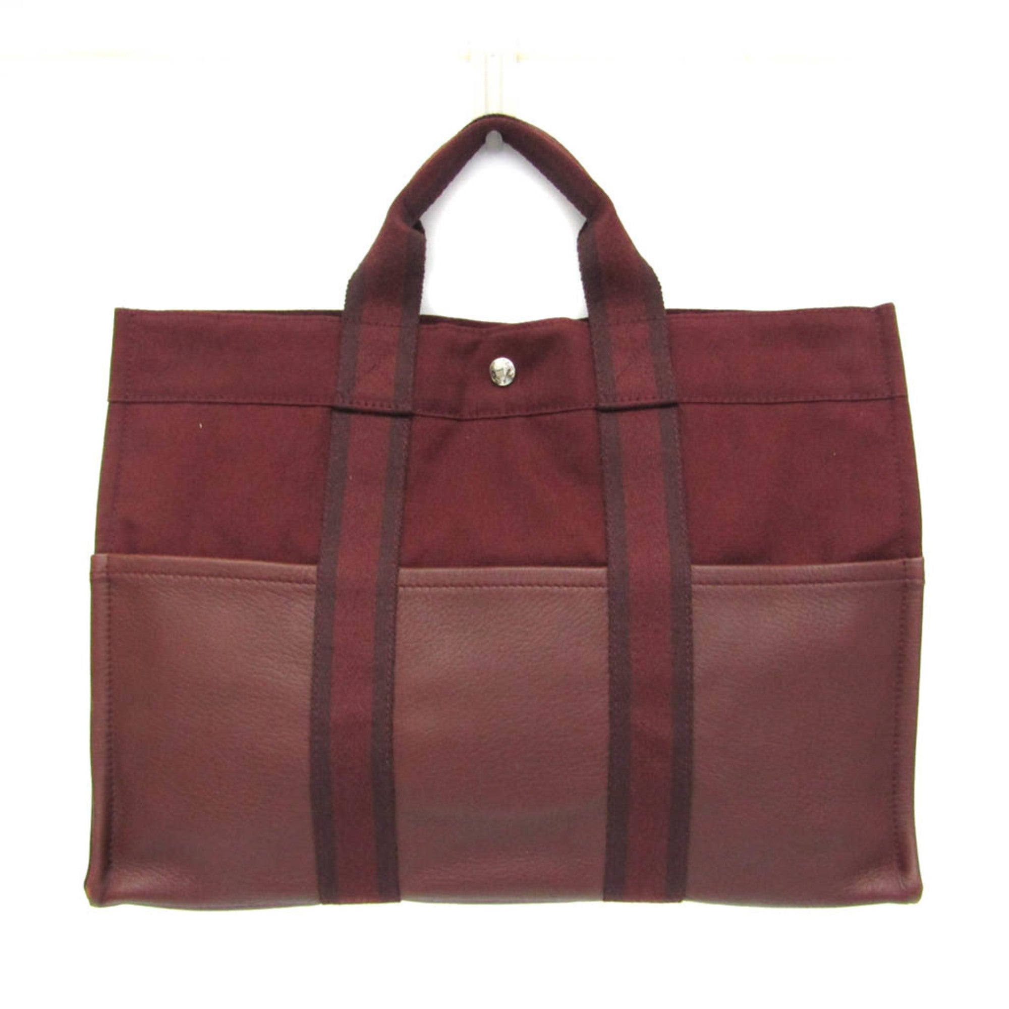 HERMÈS Pre-Loved Fourre Tout MM tote bag in burgundy with dual handles and spacious pockets