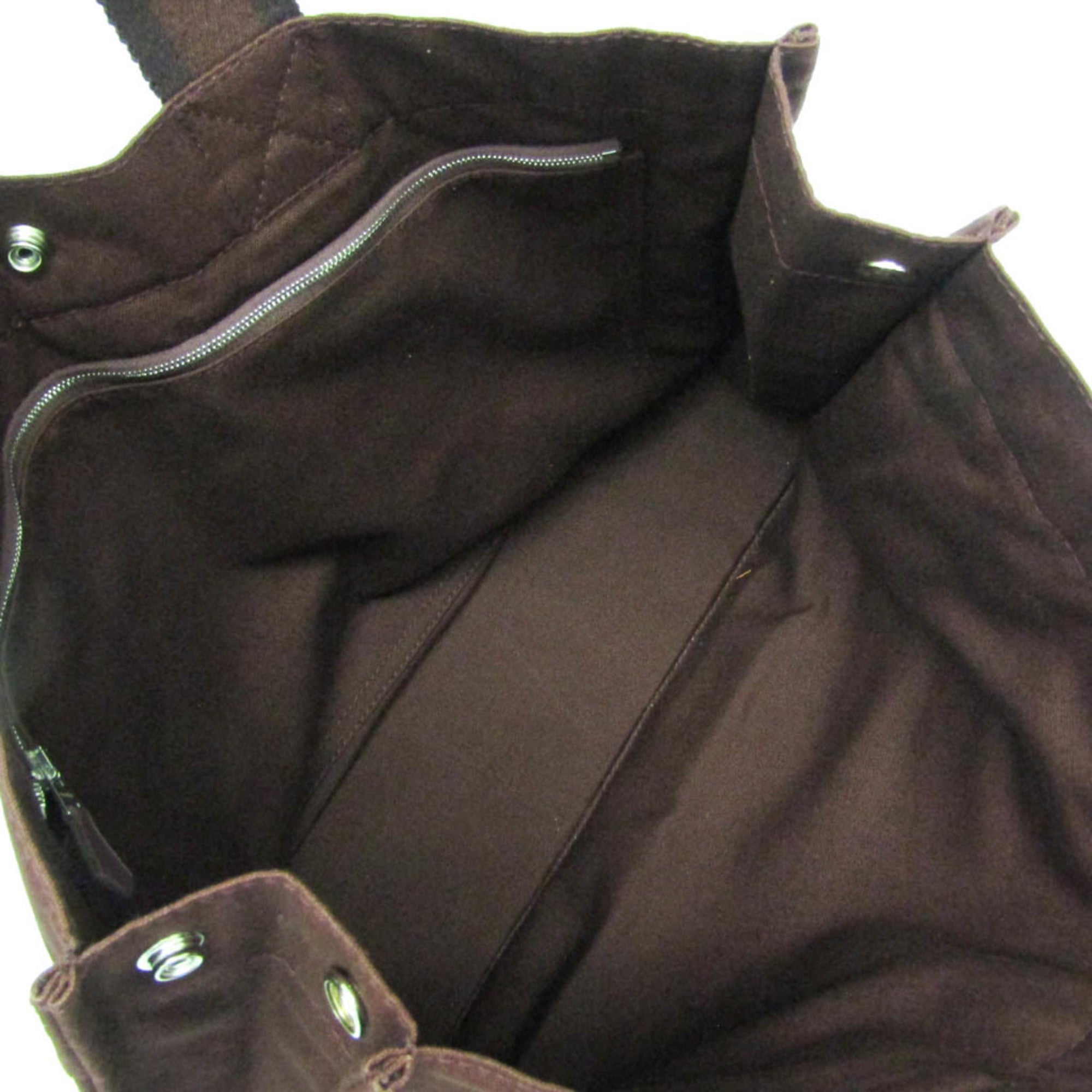 Interior view of the HERMÈS Pre-Loved Fourre Tout MM tote bag featuring a spacious and organized design.