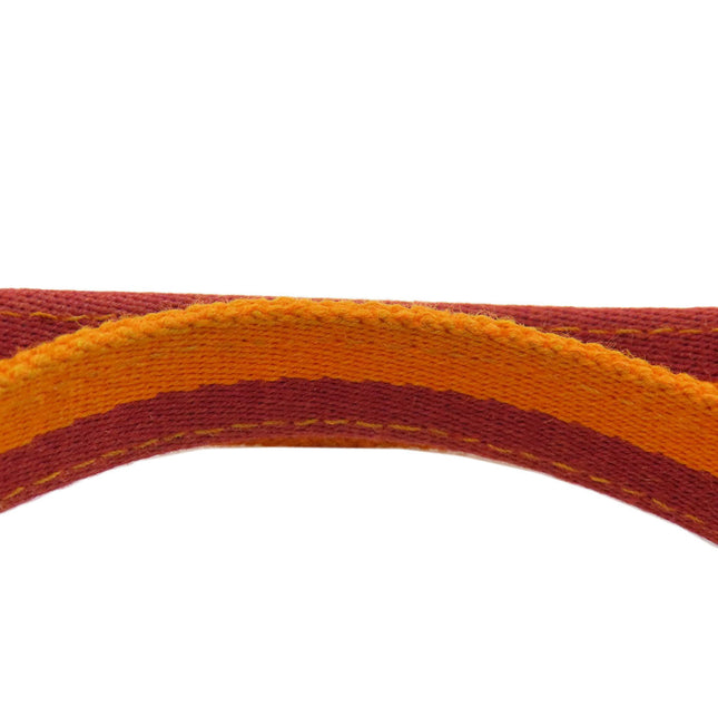 HERMES pre-owned bag strap in vibrant red and orange with intricate stitching details