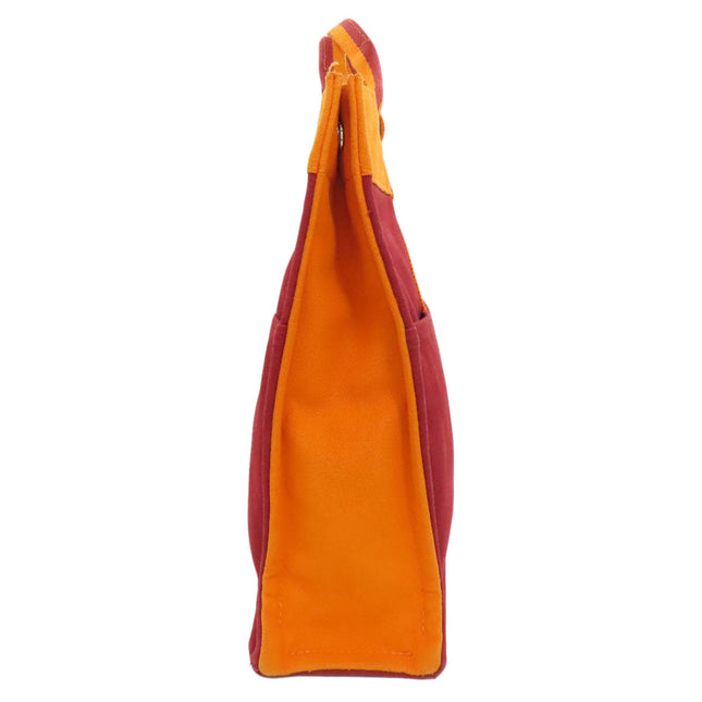 Side view of HERMES pre-owned bag featuring a vibrant color combination and spacious interior