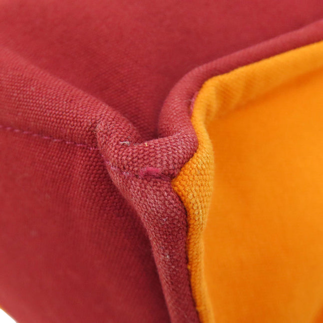HERMES pre-owned bag featuring a vibrant maroon and orange color contrast with sturdy stitching