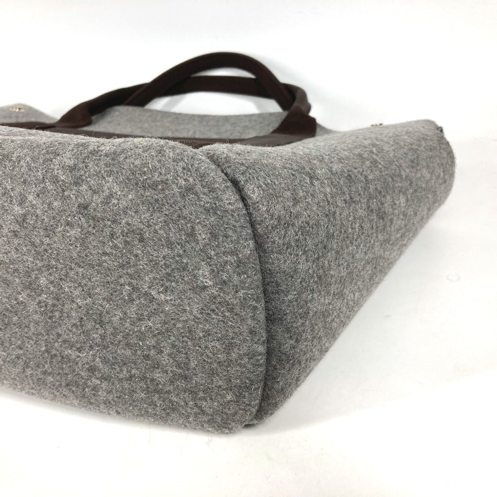 HERMES pre-owned grey felt bag with brown leather handles, ideal for stylish everyday use