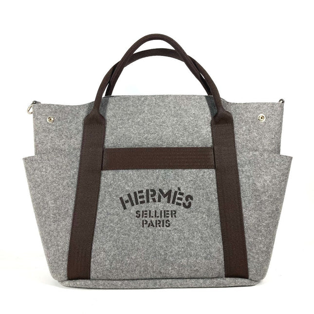 HERMES pre-owned wool felt tote bag with iconic branding and dual handles for daily use