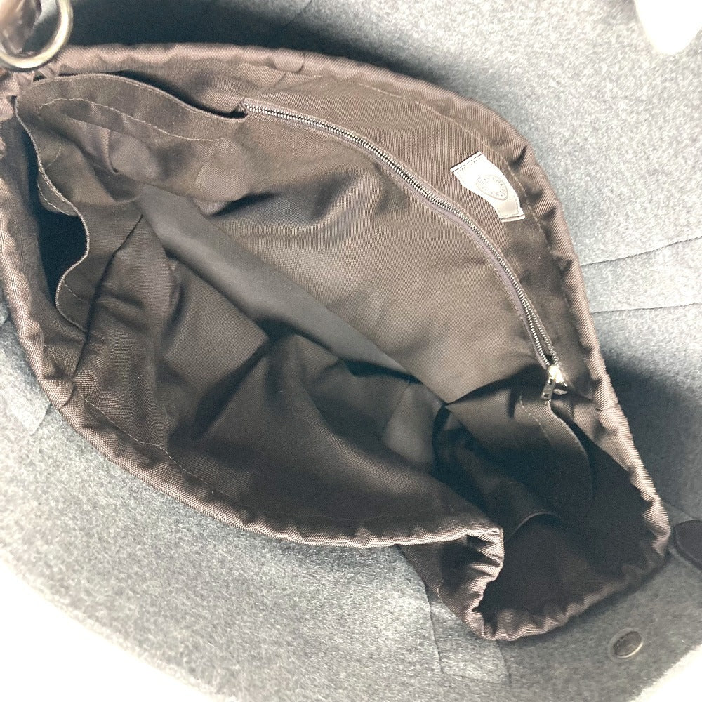 Interior view of a pre-owned HERMES bag showing spacious black fabric lining and zip pocket