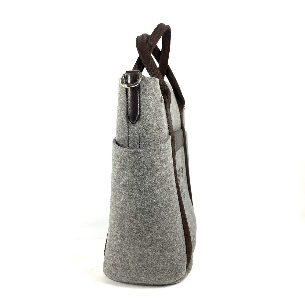HERMES Gray Pre-Owned Bag with Leather Accents and Side Pockets for Everyday Use