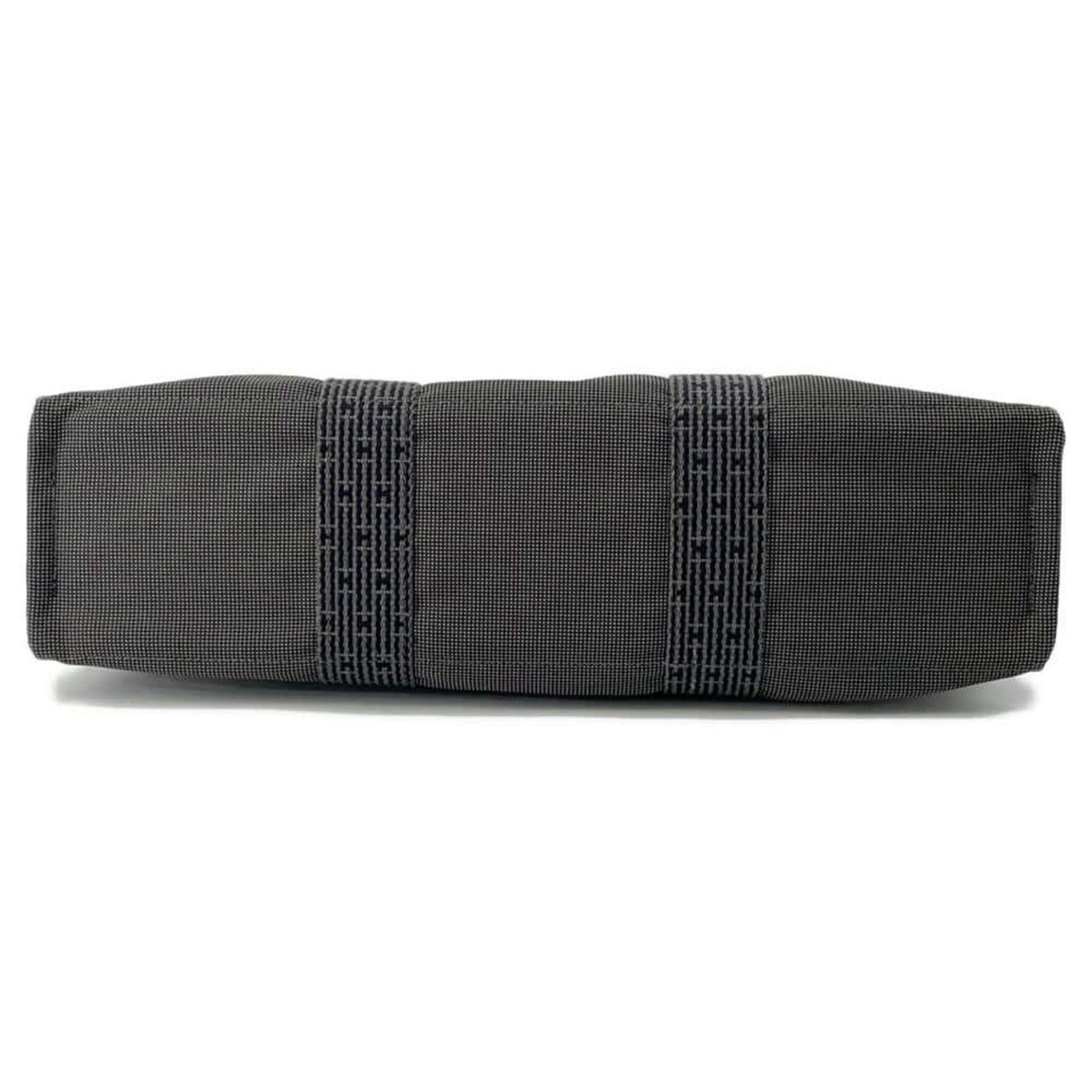 Hermes pre-owned bag in charcoal grey with stylish black stripe detailing