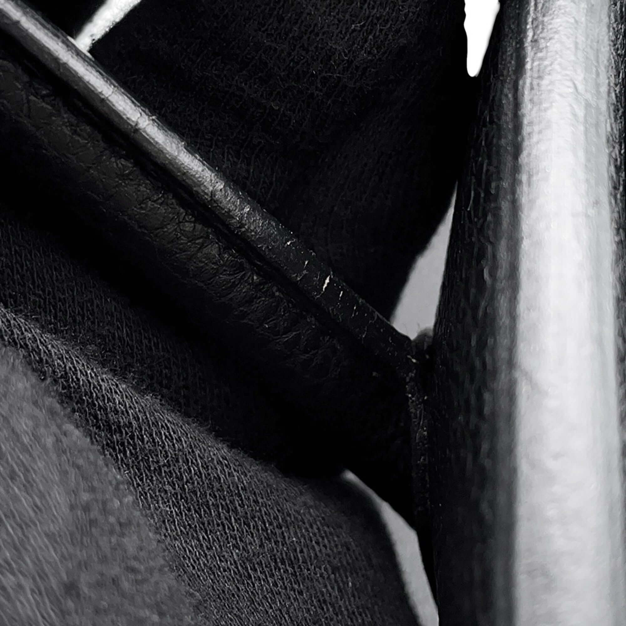 Close-up view of a pre-owned Hermès Birkin 30 showcasing fine leather detailing and hardware