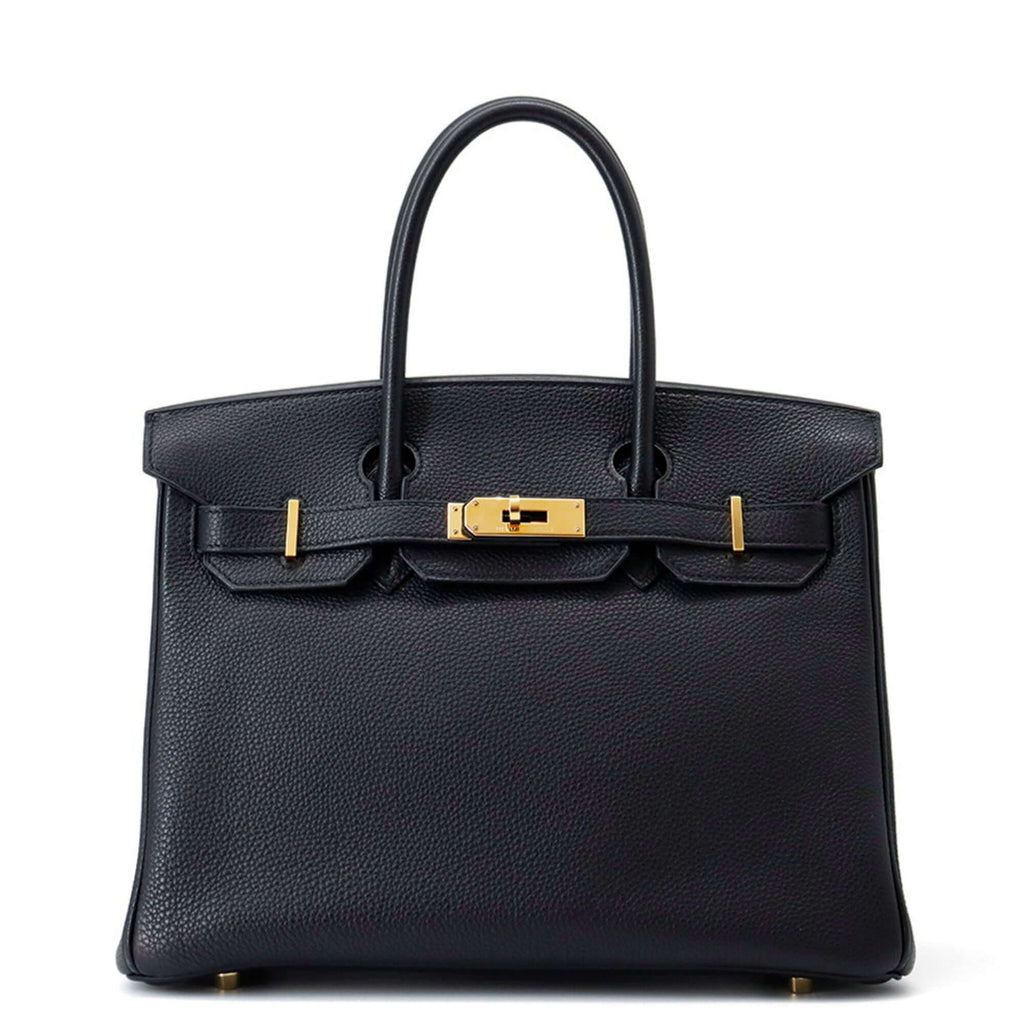 Elegant pre-owned Hermès Birkin 30 handbag in black leather with gold hardware