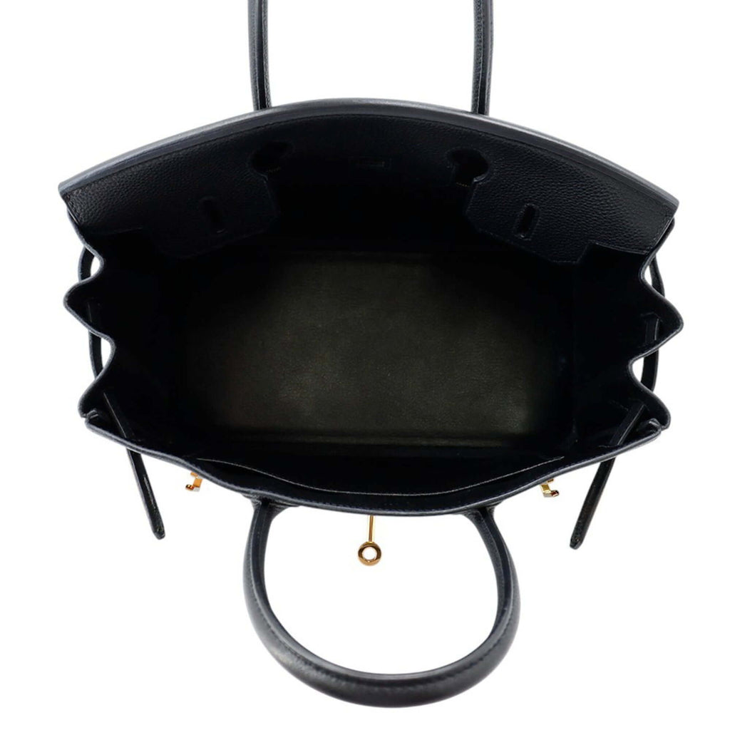 Interior view of a pre-owned Hermès Birkin 30 handbag showcasing its spacious design and luxurious craftsmanship