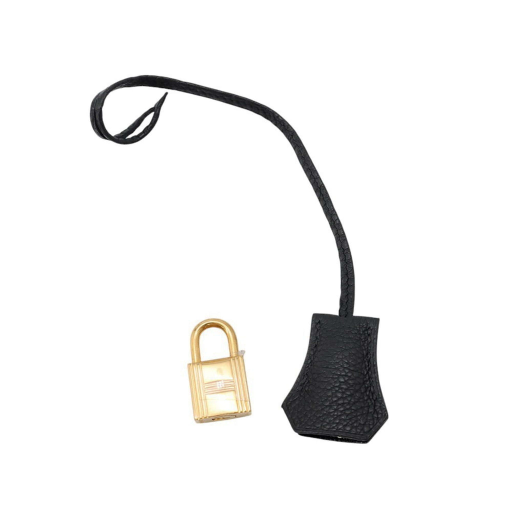 Black leather lock and key for pre-owned Hermès Birkin 30 handbag, featuring a gold padlock