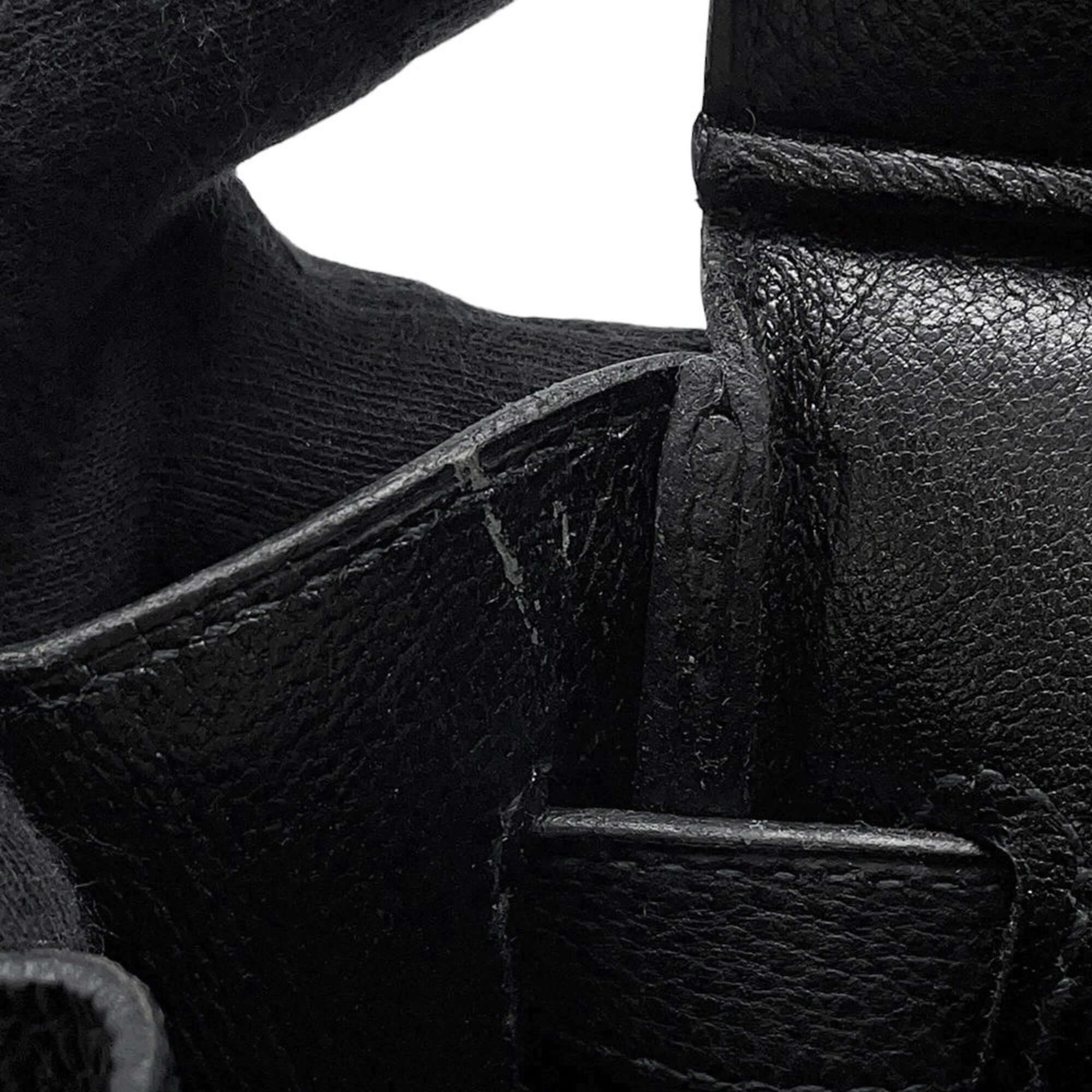 Close-up of pre-owned Hermès Birkin 30 showing high-quality leather and detailing