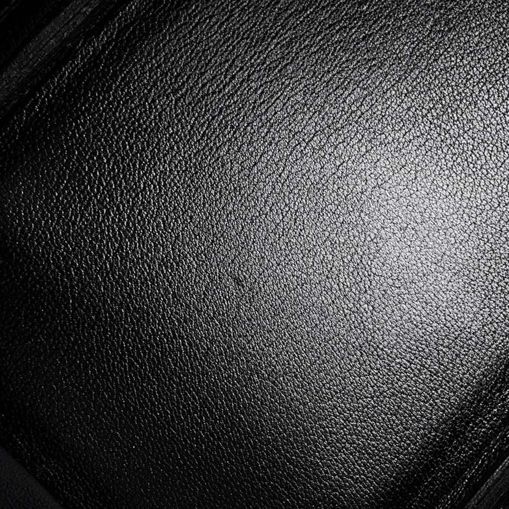 Close-up of the luxurious leather texture of a pre-owned Hermès Birkin 30 handbag