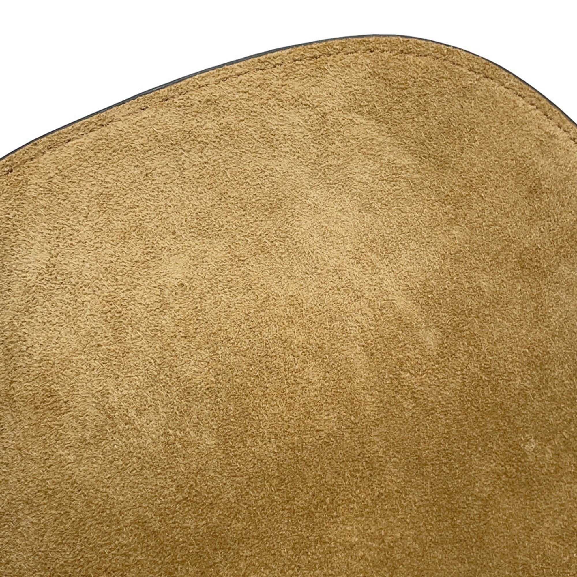 Close-up of the soft suede texture of the LOEWE Pre-Loved Gate Mini Raffia Bag in a warm tone