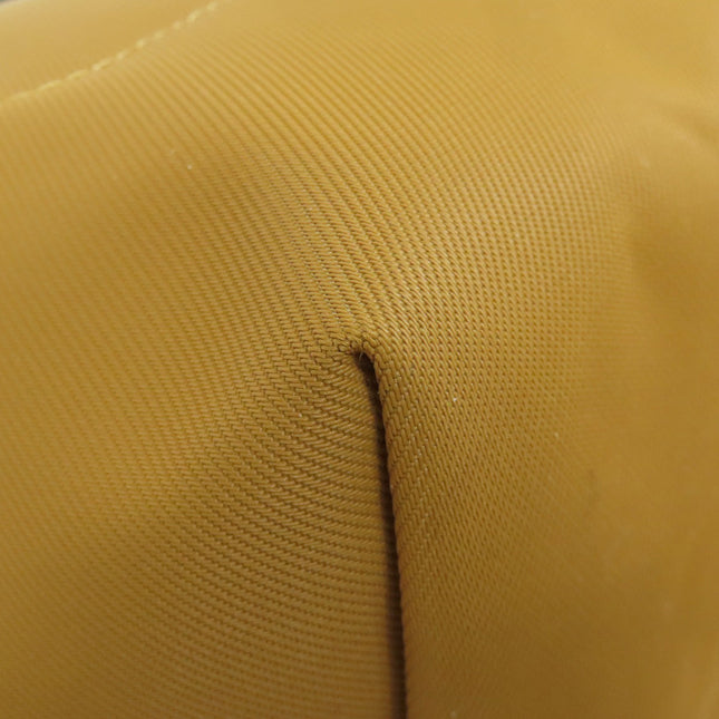 Pre-owned Longchamp bag corner detail showcasing fabric texture and condition