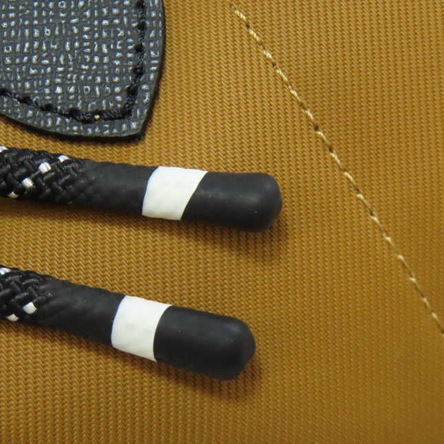Close-up of Longchamp pre-owned bag strap details showcasing high-quality craftsmanship