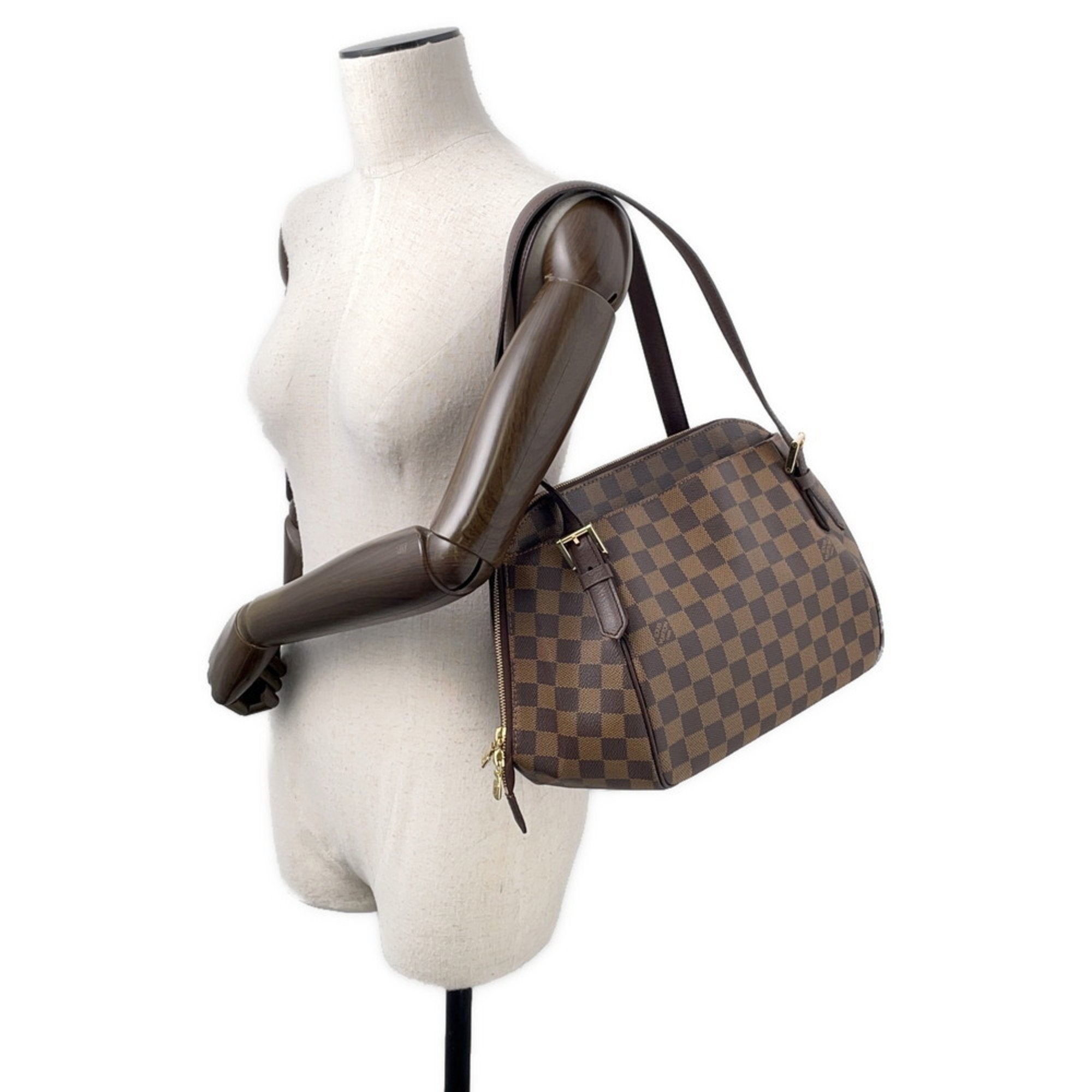 Authentic Louis Vuitton Belem MM bag for sale in brown Damier canvas with elegant design and versatile carry options
