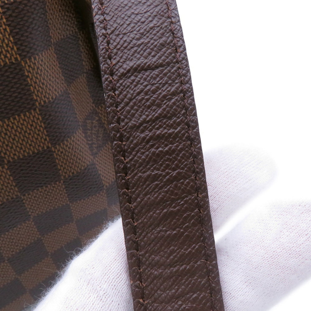 Close-up of the handle of an authentic Louis Vuitton Belem MM bag for sale featuring the signature Damier canvas