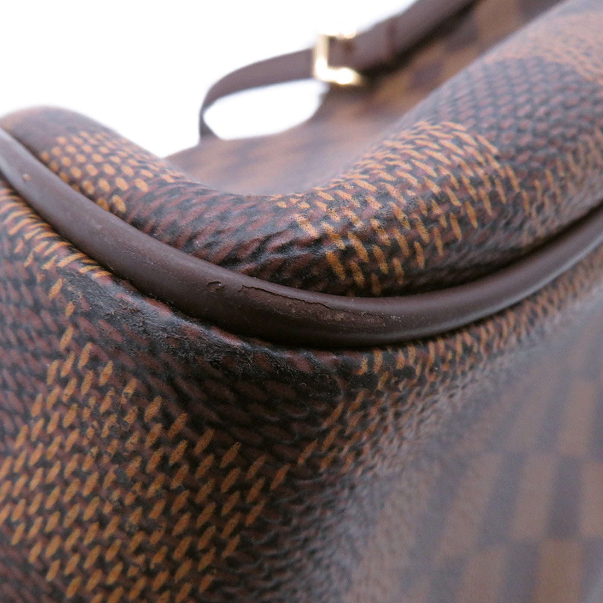 Close-up of authentic Louis Vuitton Belem MM bag for sale showcasing signature Damier canvas detail