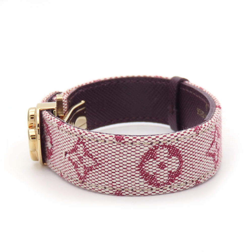Authentic secondhand Louis Vuitton jewelry, featuring a stylish pink patterned bracelet with gold accents.
