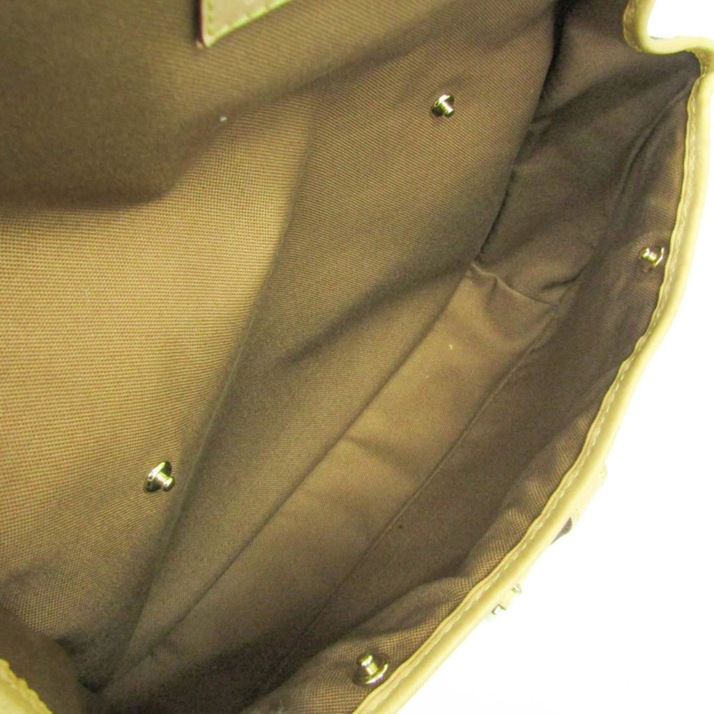 Interior view of LOUIS VUITTON pre-loved Congo PM bag with fabric lining and metal studs