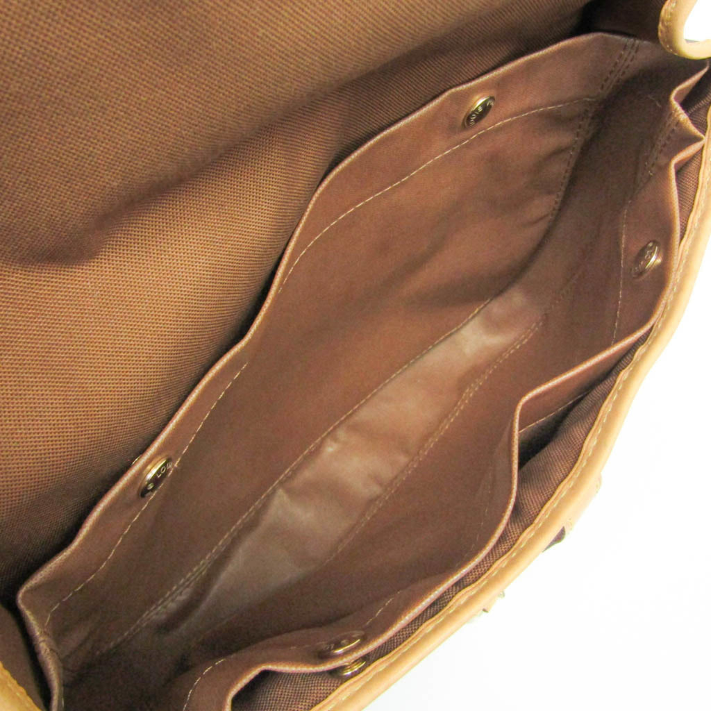 Interior view of LOUIS VUITTON pre-loved Congo PM bag featuring spacious compartments and a rich lining