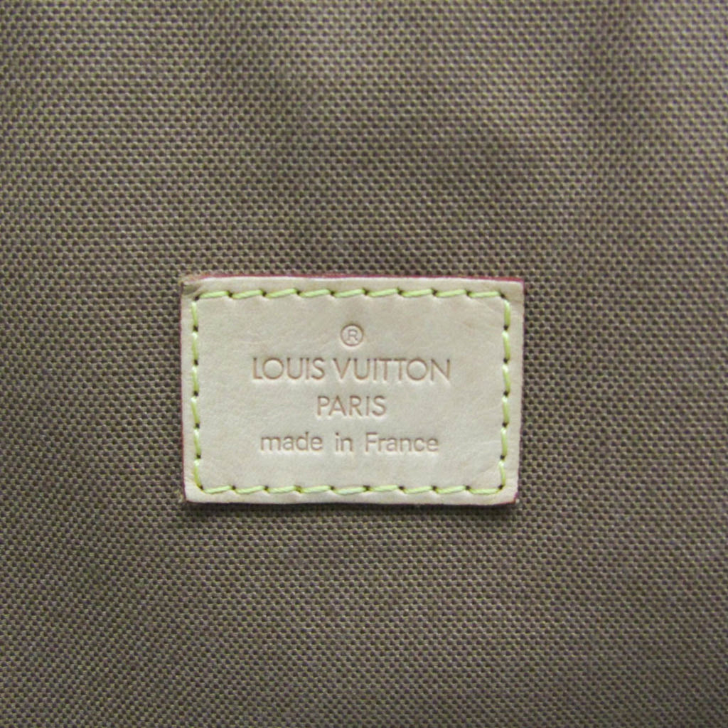 Close-up of LOUIS VUITTON pre-loved Congo PM label showcasing fine craftsmanship and authenticity