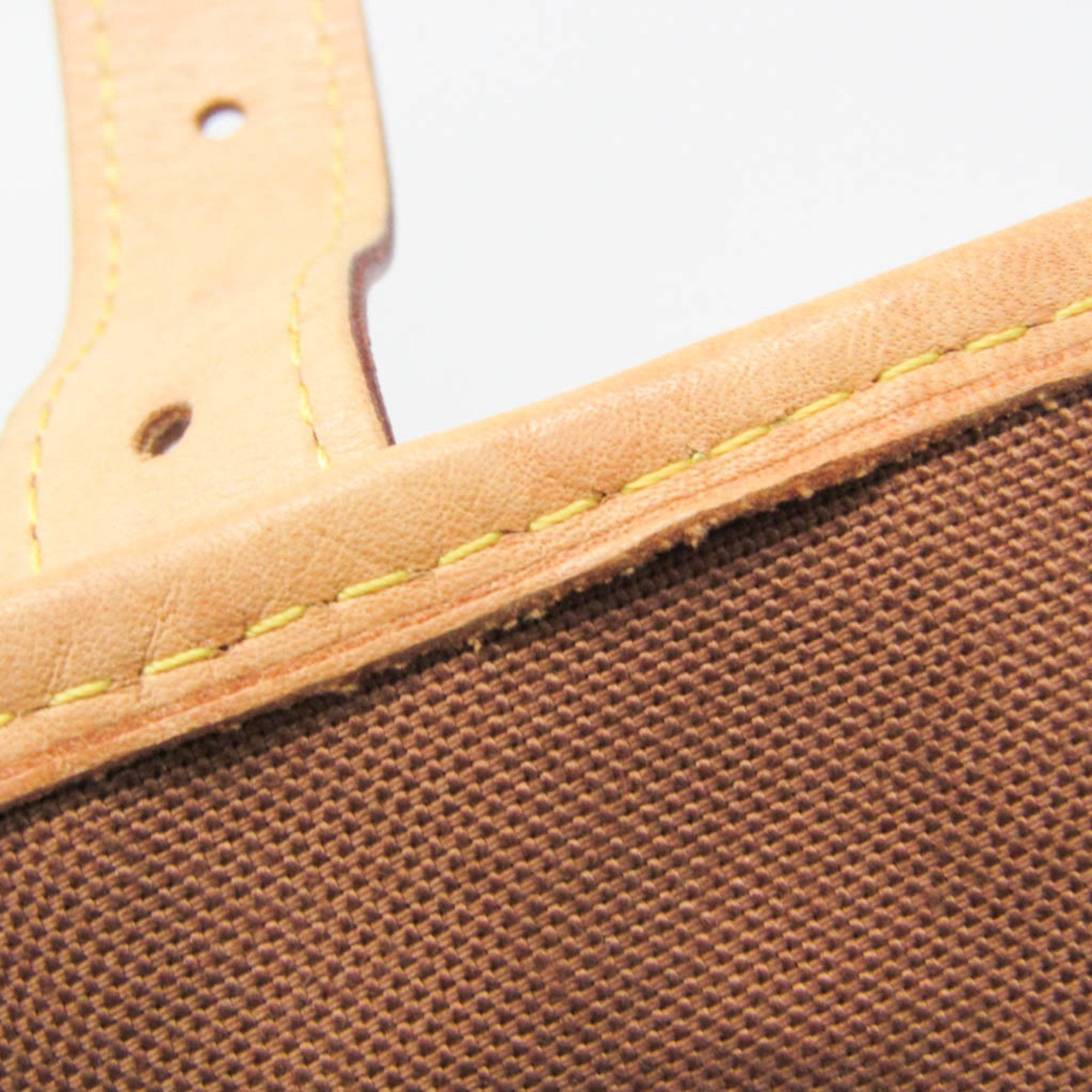 Detailed close-up of LOUIS VUITTON pre-loved Congo PM bag strap showcasing sturdy stitching and texture