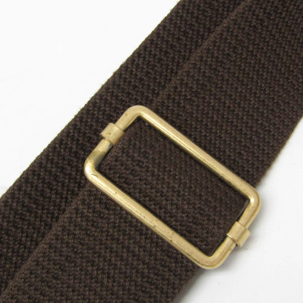 Close-up of the buckle on a LOUIS VUITTON pre-loved Congo PM bag with a textured strap