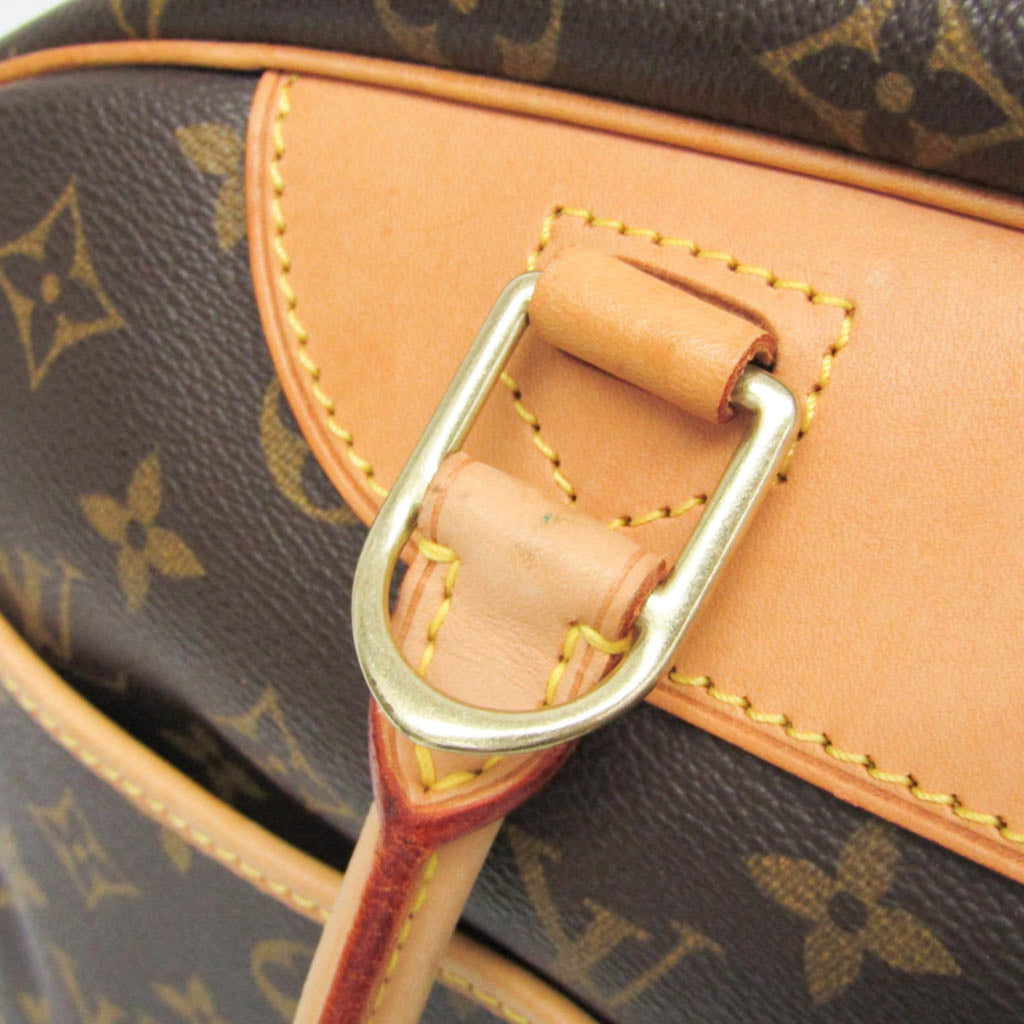 Close-up of LOUIS VUITTON pre loved Deauville bag showing leather strap and signature monogram detail