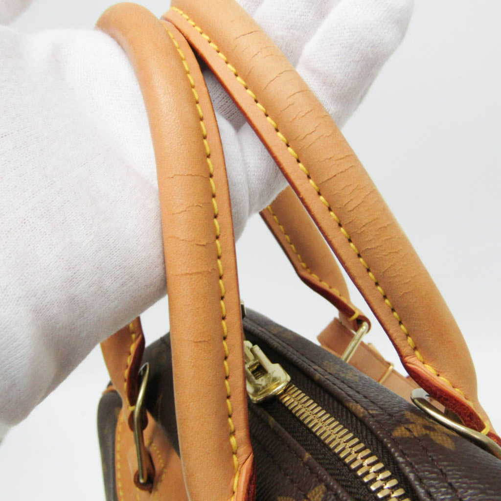 LOUIS VUITTON pre loved Deauville handbag with stylish leather handles and detailed stitching