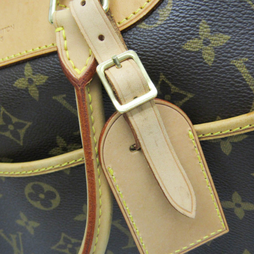 LOUIS VUITTON pre loved Deauville bag detail showing leather strap and signature monogram pattern