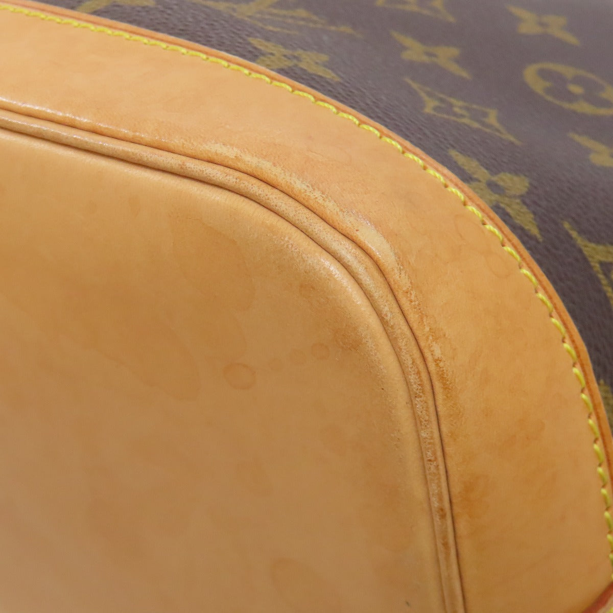 Pre-owned Louis Vuitton handbag showing soft leather texture and signature monogram patterns
