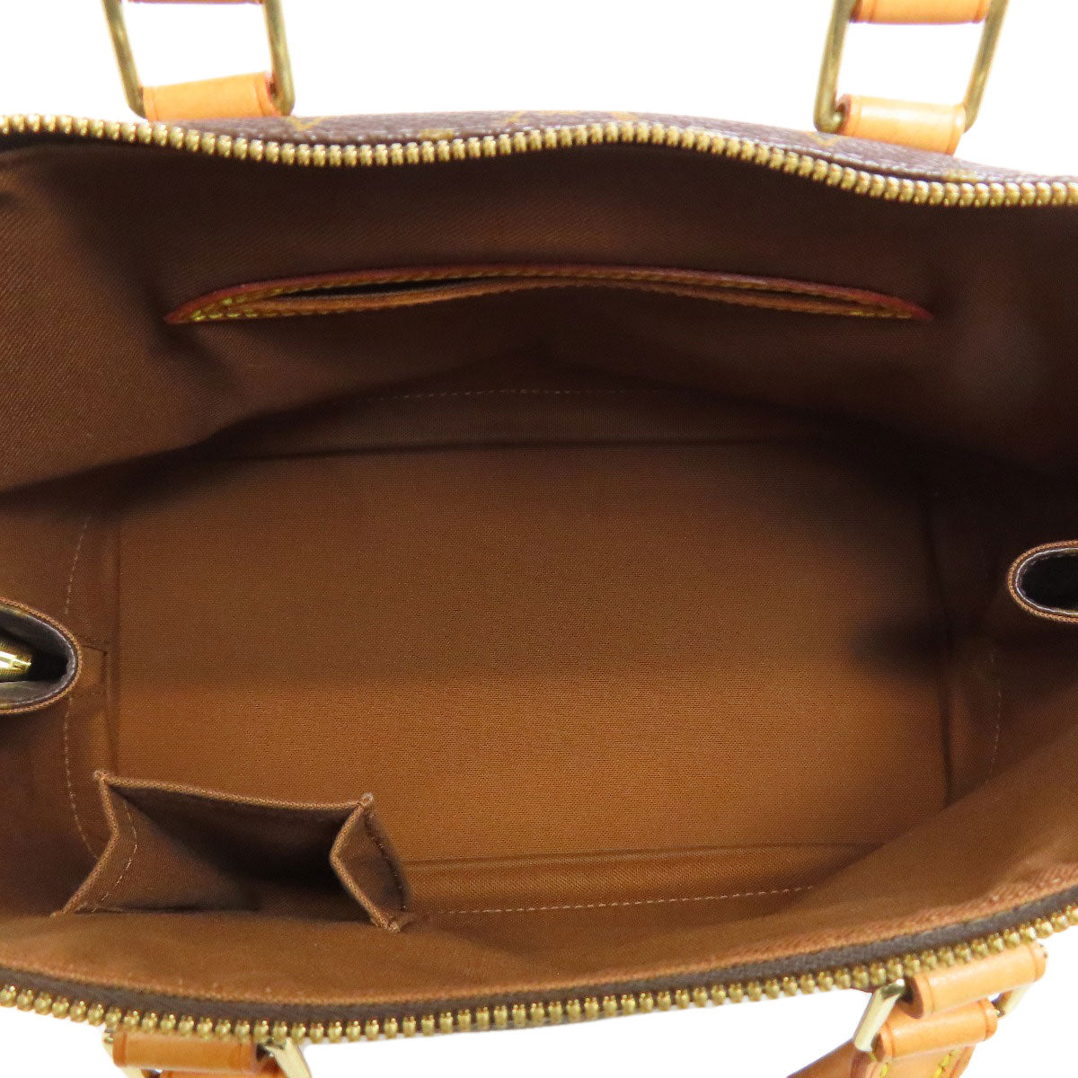 Interior view of a LOUIS VUITTON pre-owned bag showcasing spacious design and multiple pockets