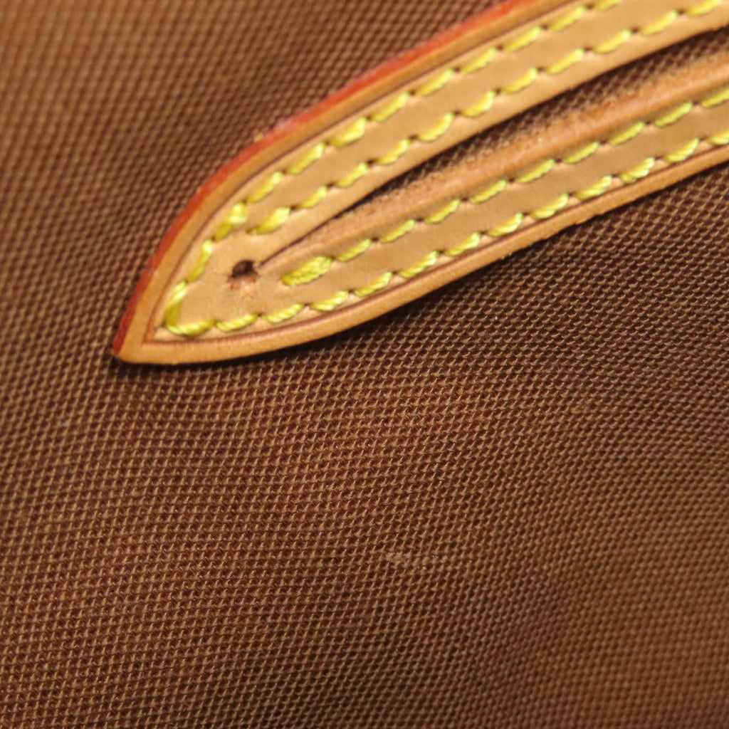 Close-up of pre-owned Louis Vuitton bag detailing with stitching on durable fabric