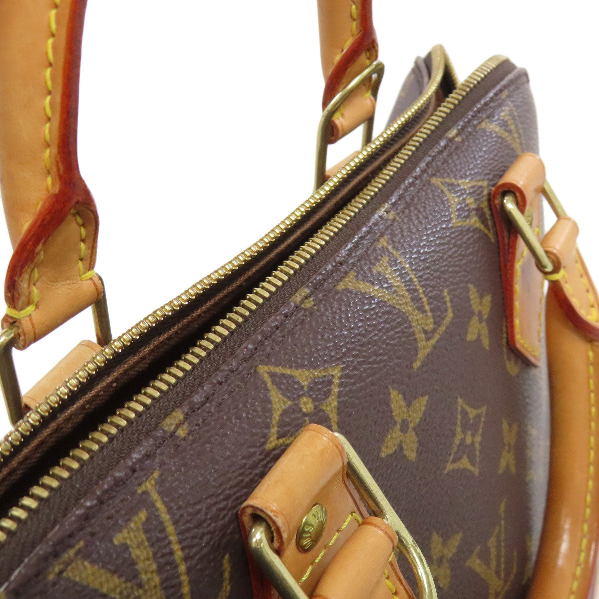 Pre-owned Louis Vuitton handbag with signature monogram and secure zipper closure