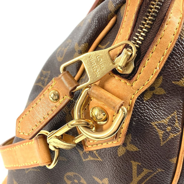 Close-up of a LOUIS VUITTON pre-owned bag showcasing detailed zipper and hardware