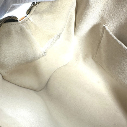 Interior view of a pre-owned Louis Vuitton bag showcasing soft lining and spacious compartment