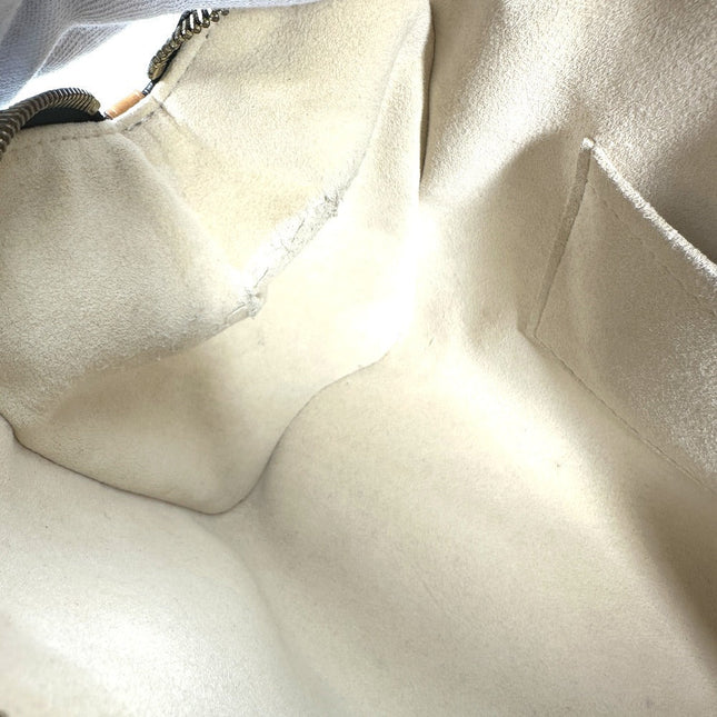 Interior view of a pre-owned Louis Vuitton bag showcasing soft lining and spacious compartment