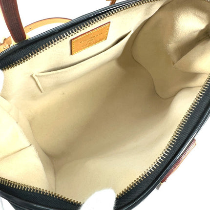Interior of a pre-owned Louis Vuitton bag with beige lining and zipper pockets for added organization