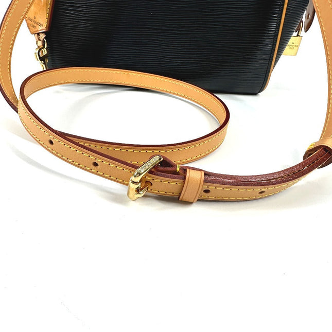 Louis Vuitton pre-owned handbag with a sleek design and complementary strap in tan leather and black canvas