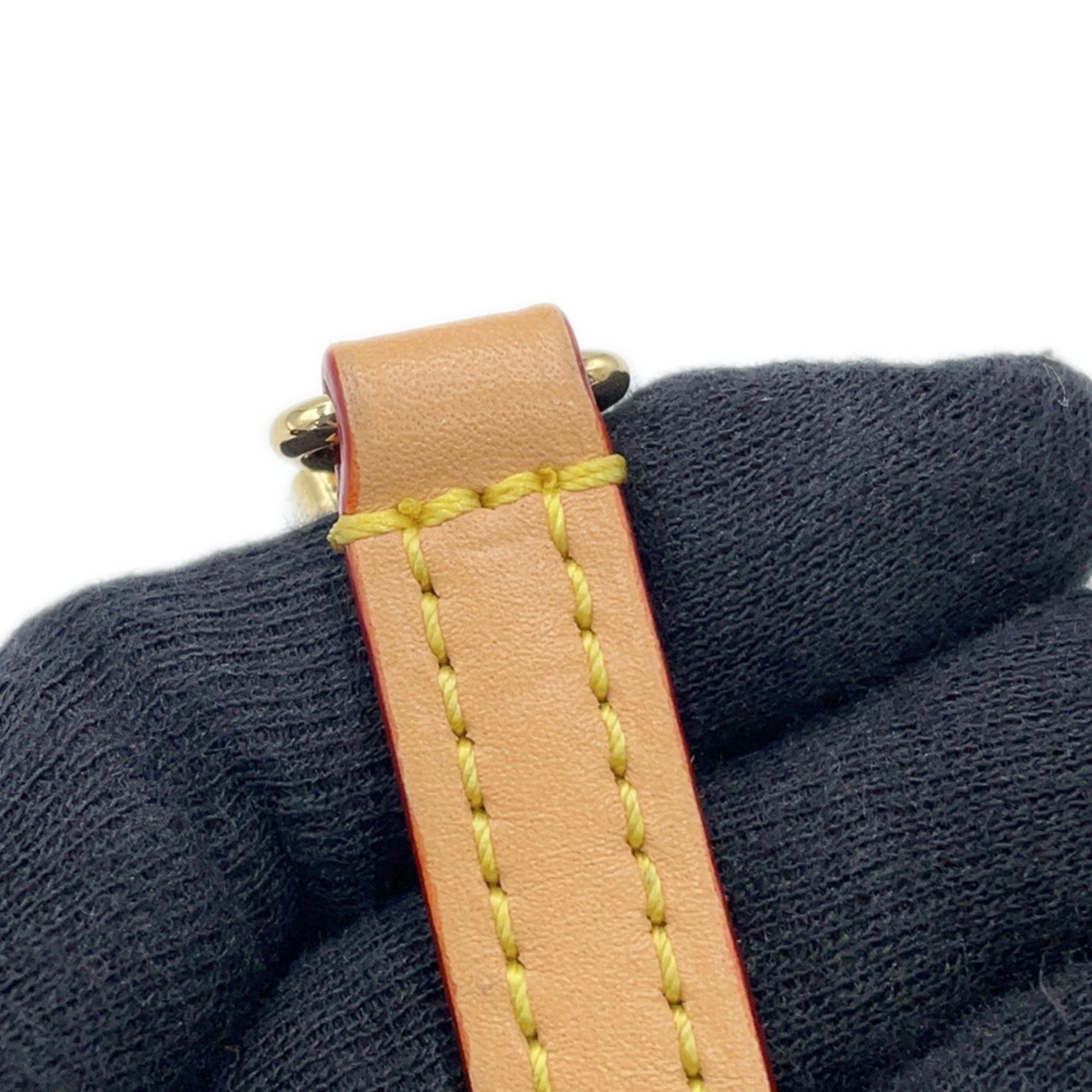 Close-up of the strap detail of a pre-owned Louis Vuitton Chantilly bag showcasing high-quality craftsmanship