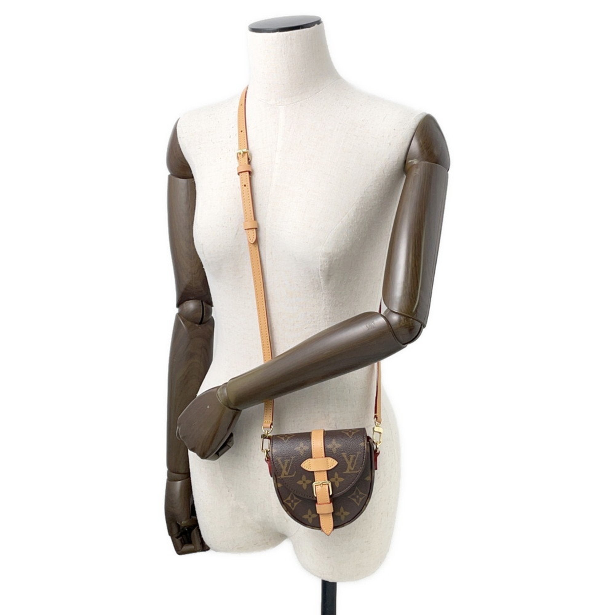 Pre-owned Louis Vuitton Chantilly bag displayed on a mannequin with a shoulder strap