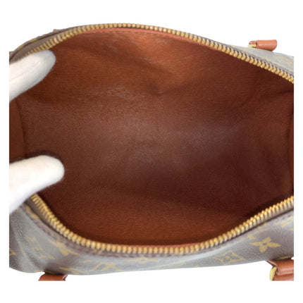 Interior view of a pre-owned Louis Vuitton bag showcasing the spacious leather lining