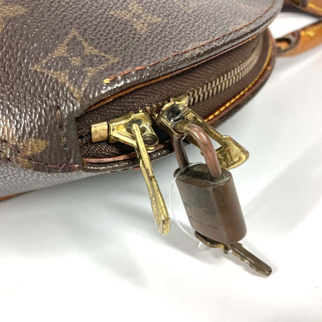 Close-up of a pre-owned Louis Vuitton bag featuring a zipper and lock detail