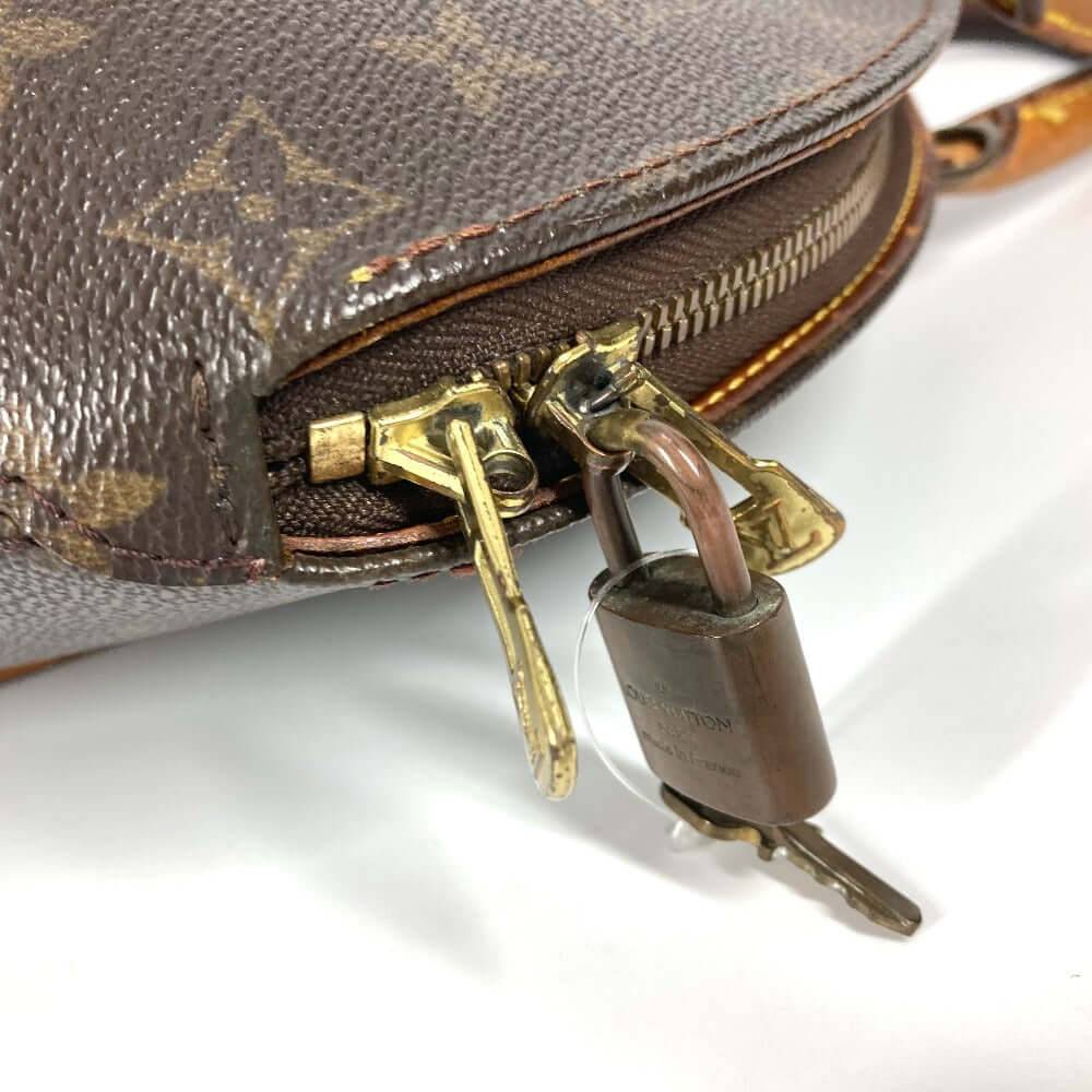 Close-up of a pre-owned Louis Vuitton bag featuring a zipper and lock detail