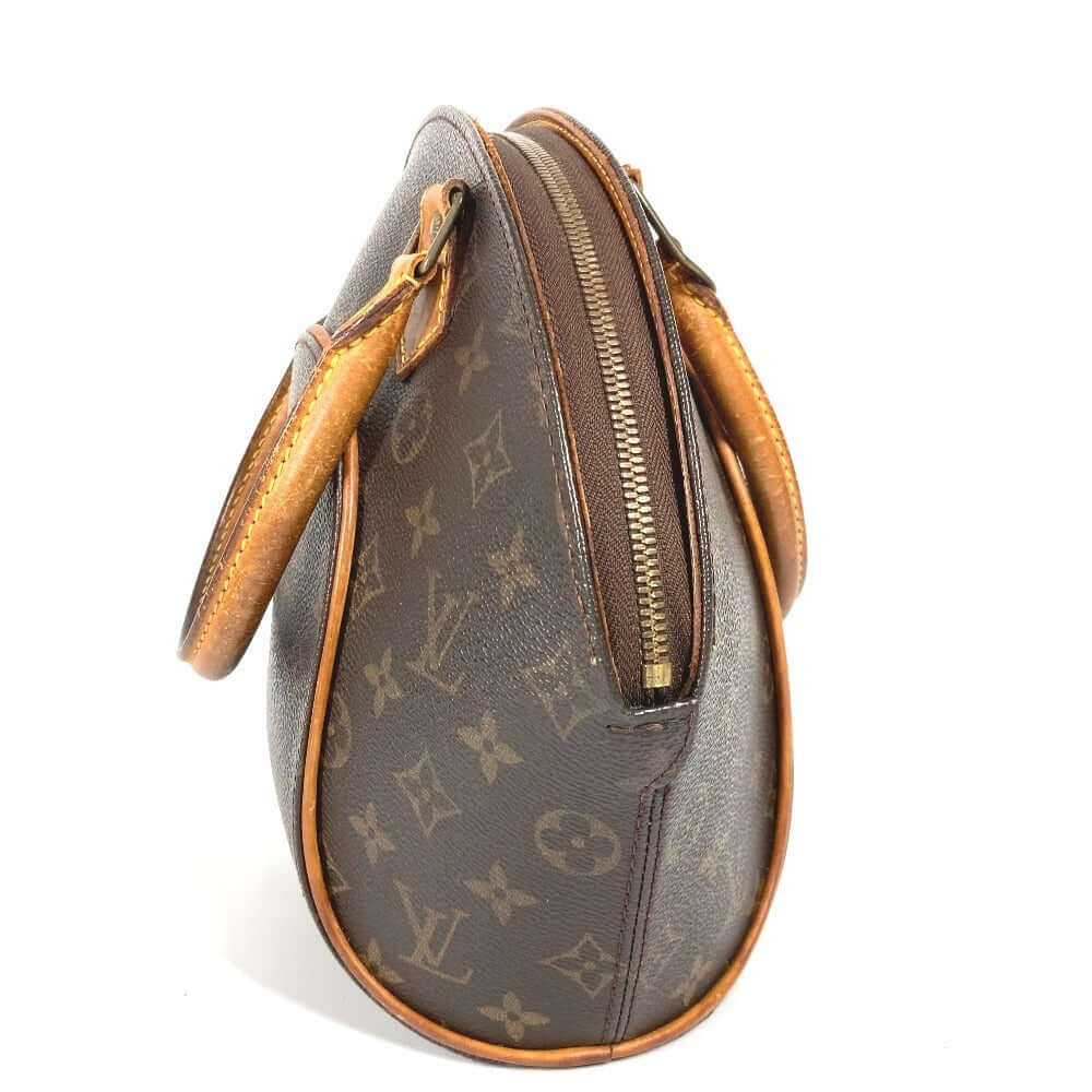 Louis Vuitton pre-owned bag with iconic monogram and leather accents for stylish everyday use