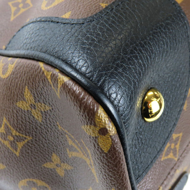 Close-up of a Pre-Owned Louis Vuitton bag showcasing its signature pattern and quality craftsmanship